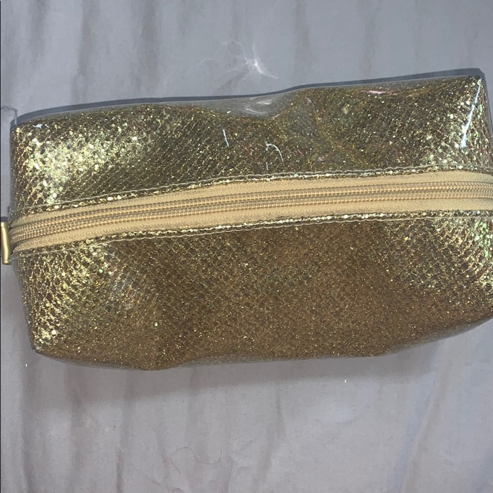 Gold makeup bag